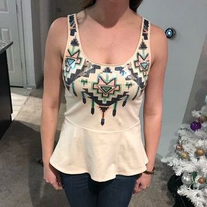 Embellished blush peplum tank